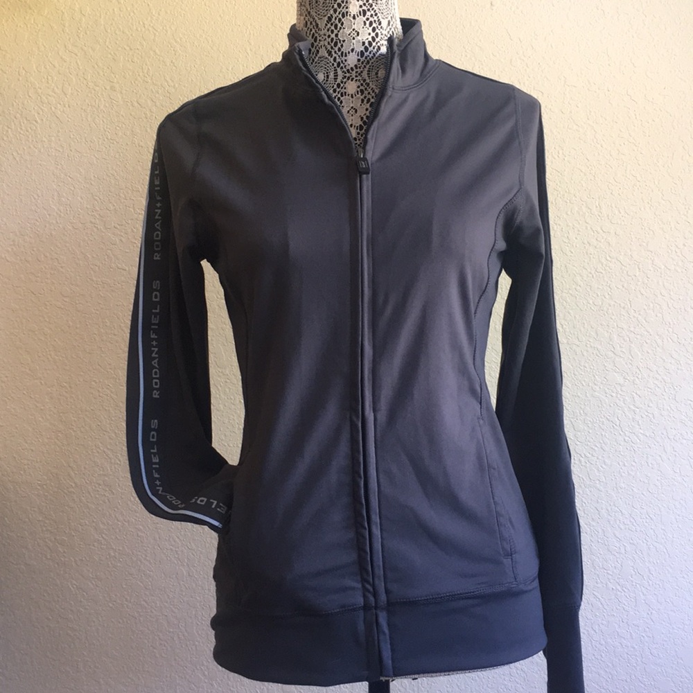 Rodan + Fields zip up athletic style jacket women’s size small